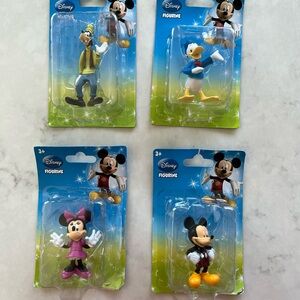 New Disney Collectables total of 4 (Mickey, Minnie, Donald, Goofy